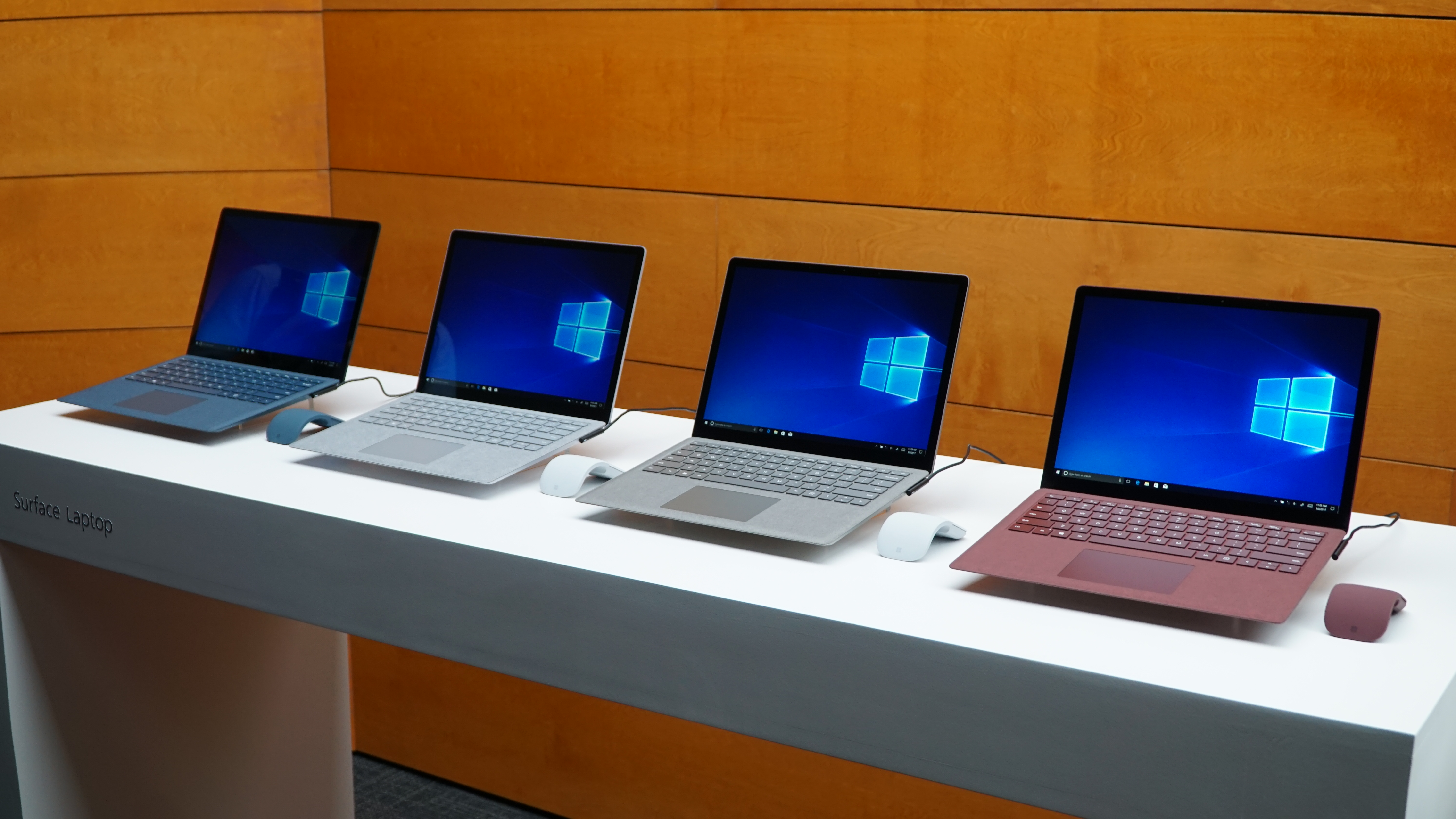 a lineup of laptops