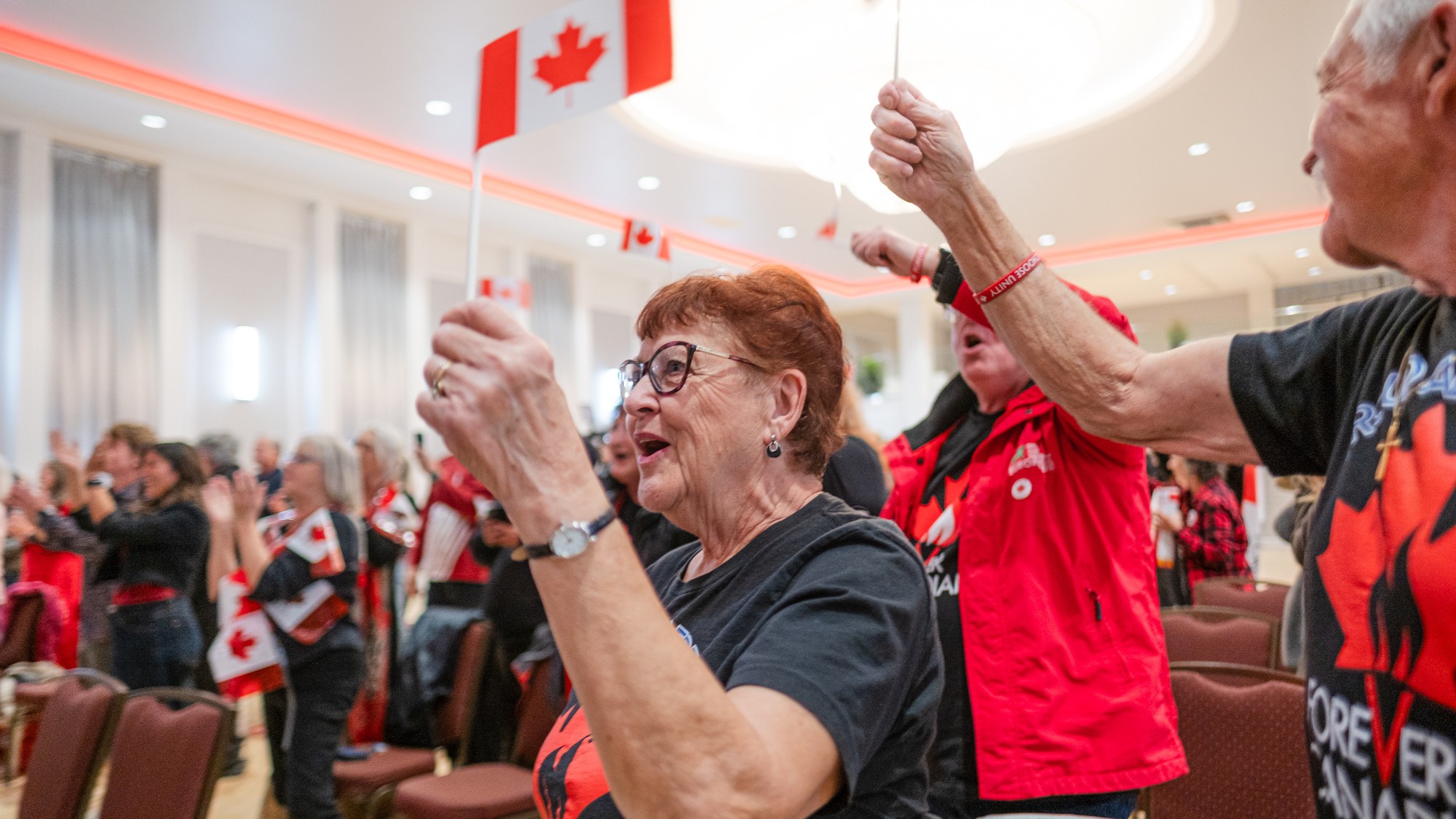 A woman waving a Canada flag after the separation referendum was lost