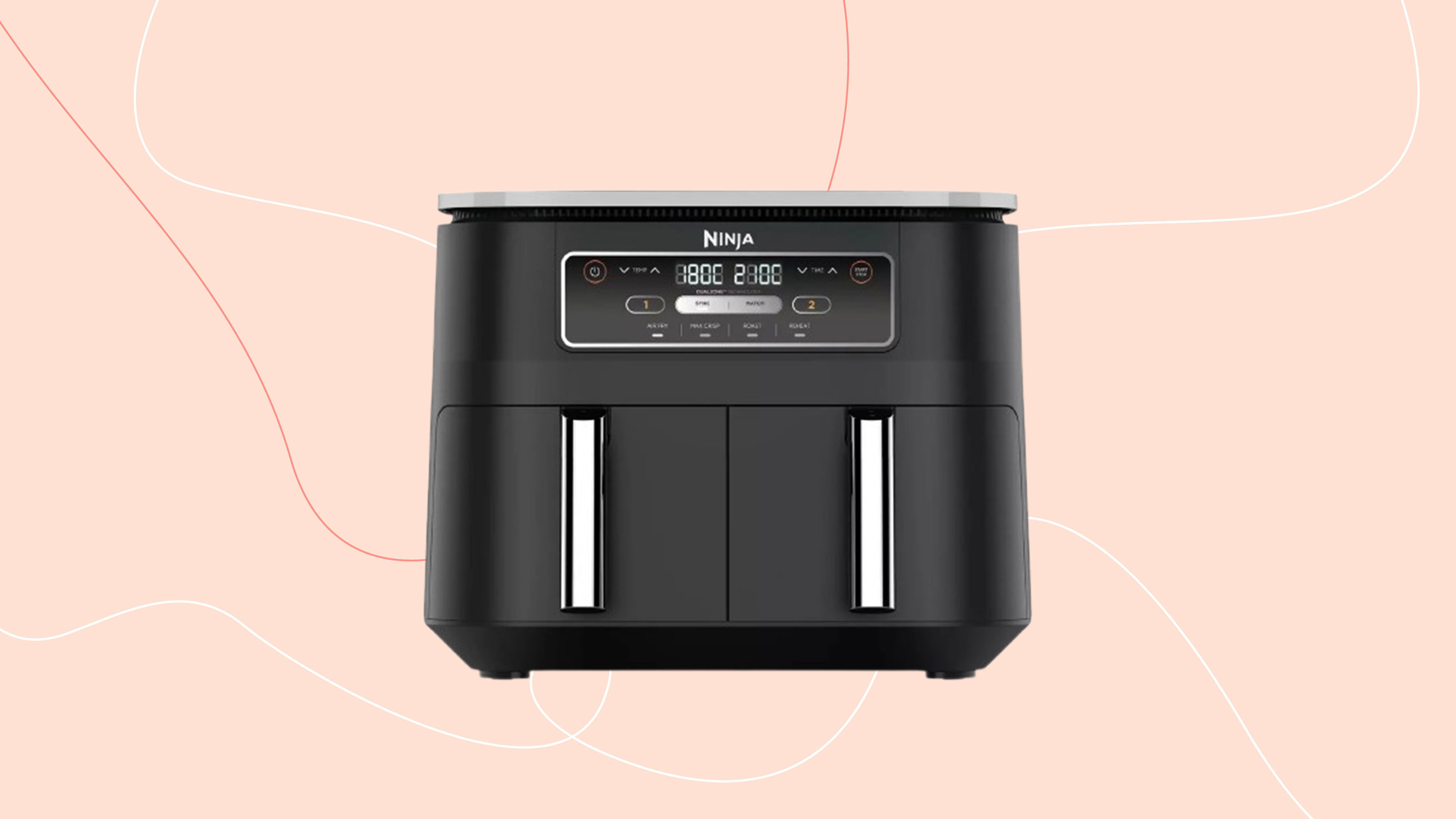Cut out of a black Ninja air fryer on a pink background