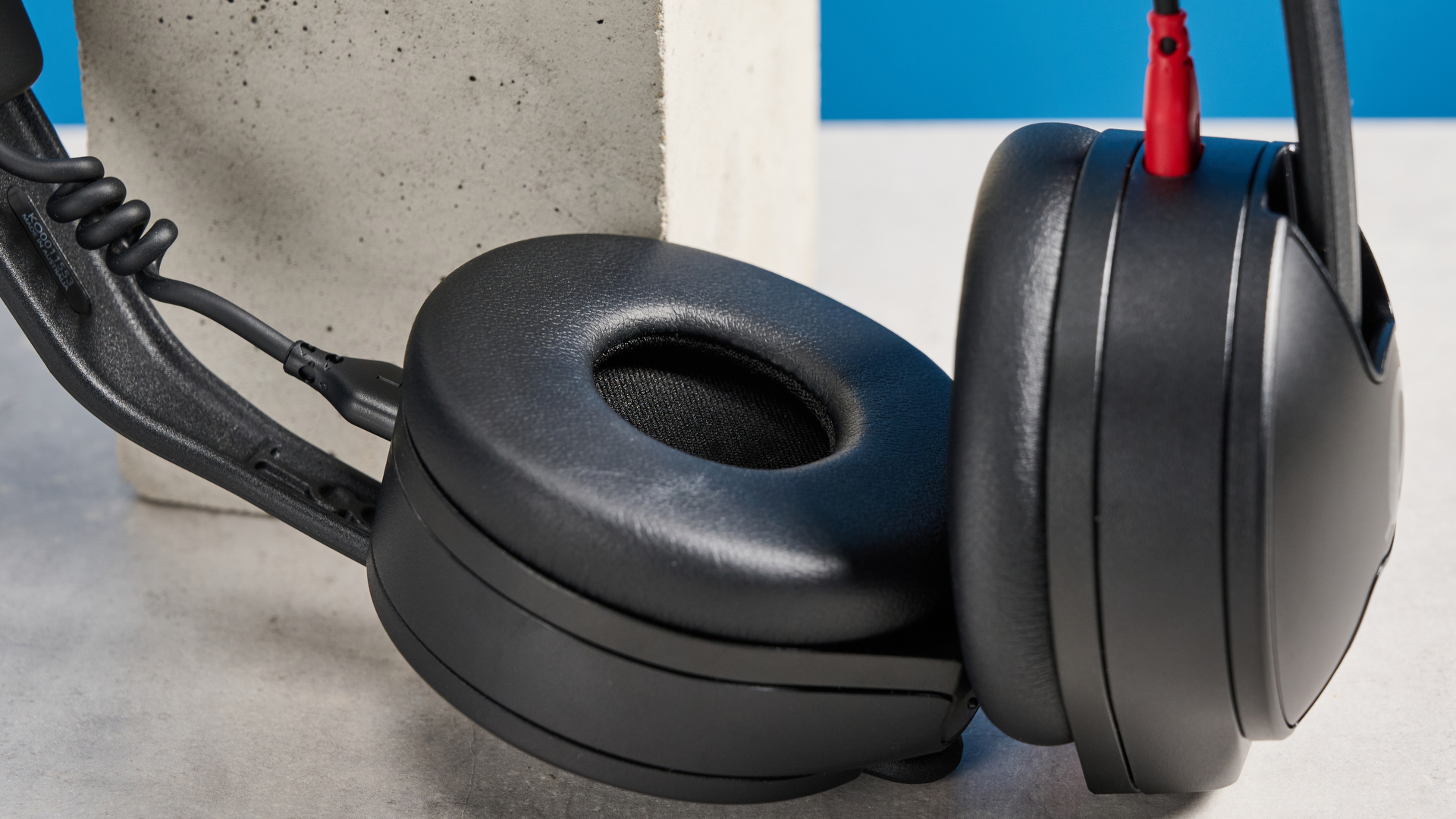 the rode nth-50 studio headphones in black showing the long cable, 3.5mm jack, 1/4 jack, and in use