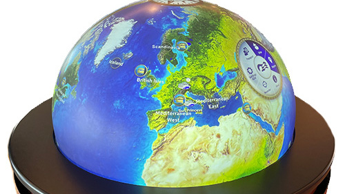 A globe with a digital, interactive display of the continents. 