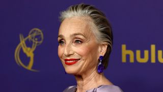 Kristin Scott Thomas is pictured wearing matte red lipstick at the 76th Primetime Emmy Awards at Peacock Theater on September 15, 2024 in Los Angeles, California.