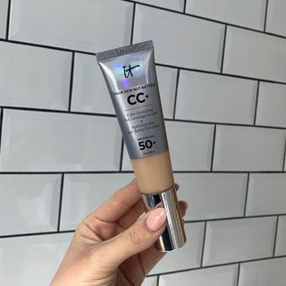 Original image showing hand holding the IT Cosmetics CC Cream