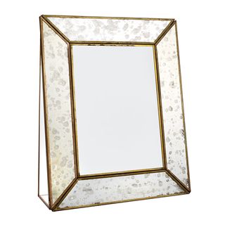 white mirror frame with glided edges