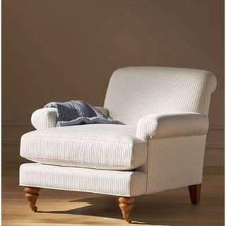 cream and blue striped armchair from Anthropologie