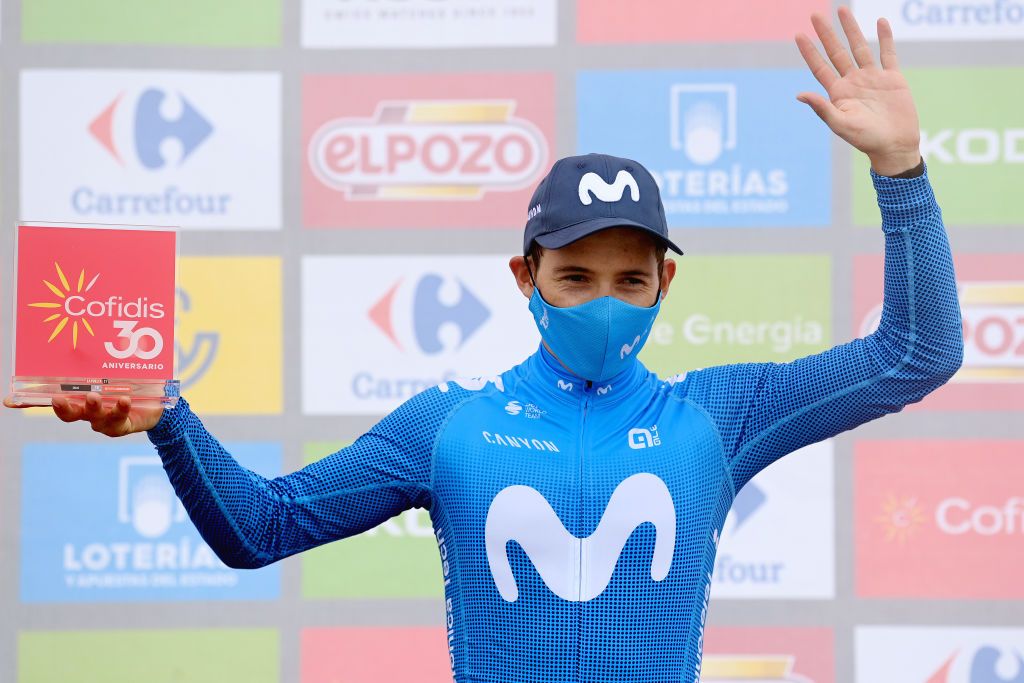 ALTU DEL GAMONITEIRU SPAIN SEPTEMBER 02 Miguel ngel Lpez Moreno of Colombia and Movistar Team celebrates winning the stage on the podium ceremony after the 76th Tour of Spain 2021 Stage 18 a 1626km stage from Salas to Altu dEl Gamoniteiru 1770m lavuelta LaVuelta21 on September 02 2021 in Altu dEl Gamoniteiru Spain Photo by Stuart FranklinGetty Images