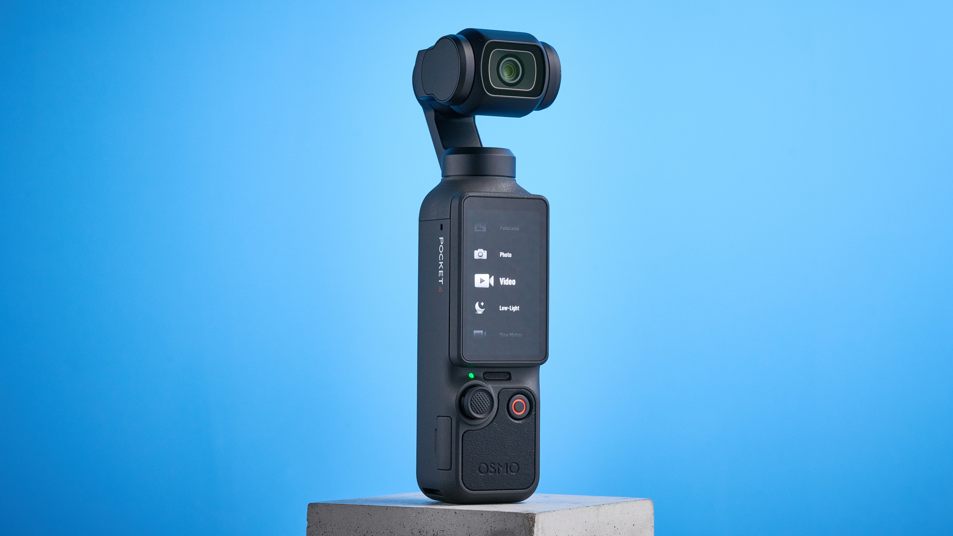 DJI Osmo Pocket 4 against a blue background