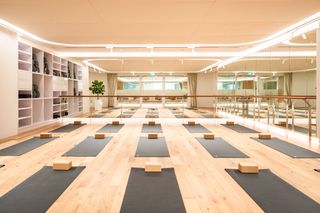 yoga mats in mirrored studio at wework singapore