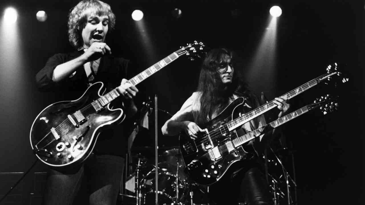 Rush&amp;rsquo;s Alex Lifeson and Geddy Lee performing onstage in 1980