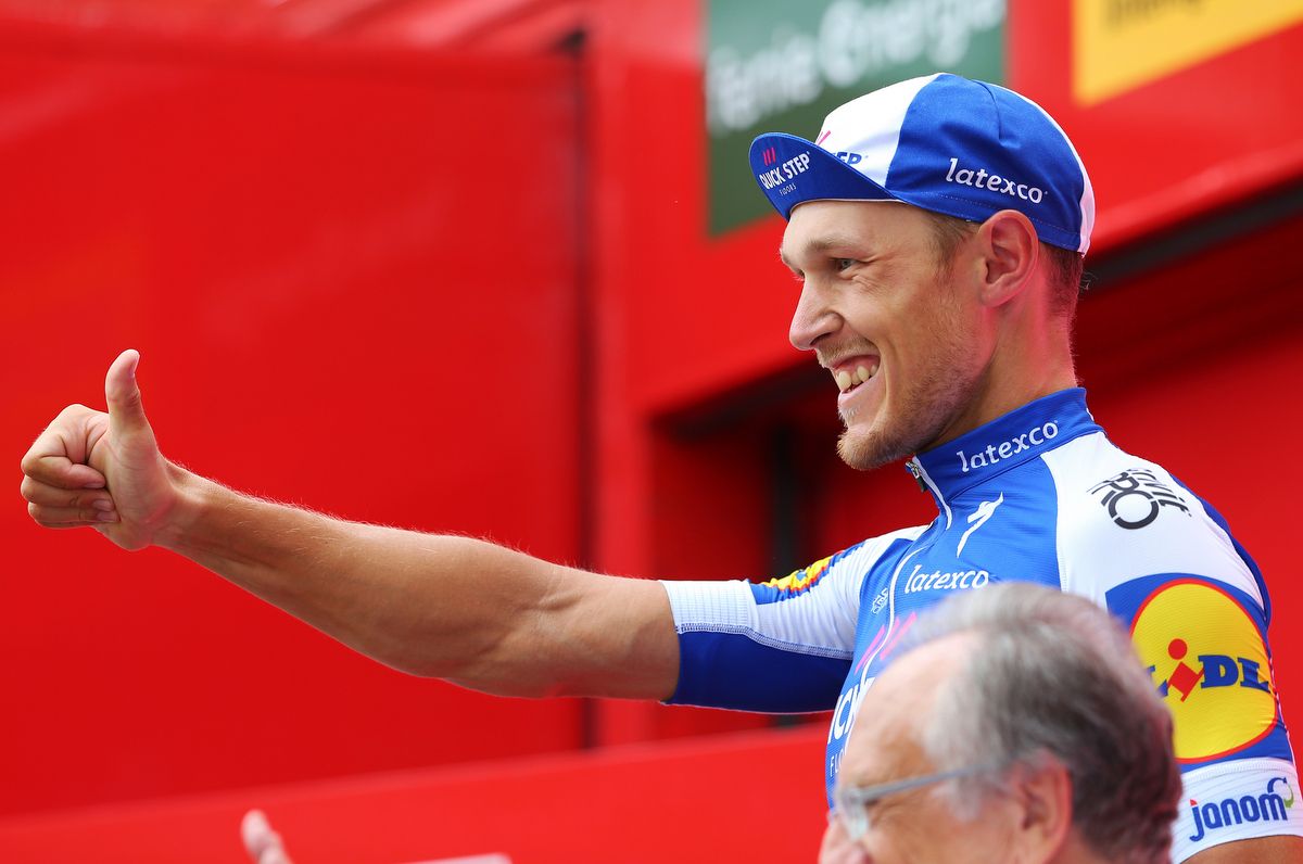 Thumbs up from Matteo Trentin on the podium