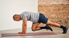 Man performing mountain climbers