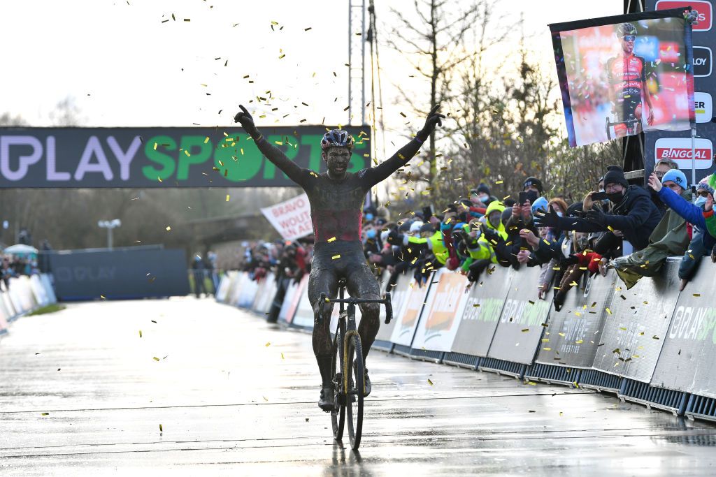 BOOM BELGIUM DECEMBER 04 Wout Van Aert of Belgium and Team Jumbo Visma celebrates at finish line as race winner during the 7th Superprestige Cyclocross Boom 2021 Mens Elite SPBoom Superprestige2022 on December 04 2021 in Boom Belgium Photo by Luc ClaessenGetty Images