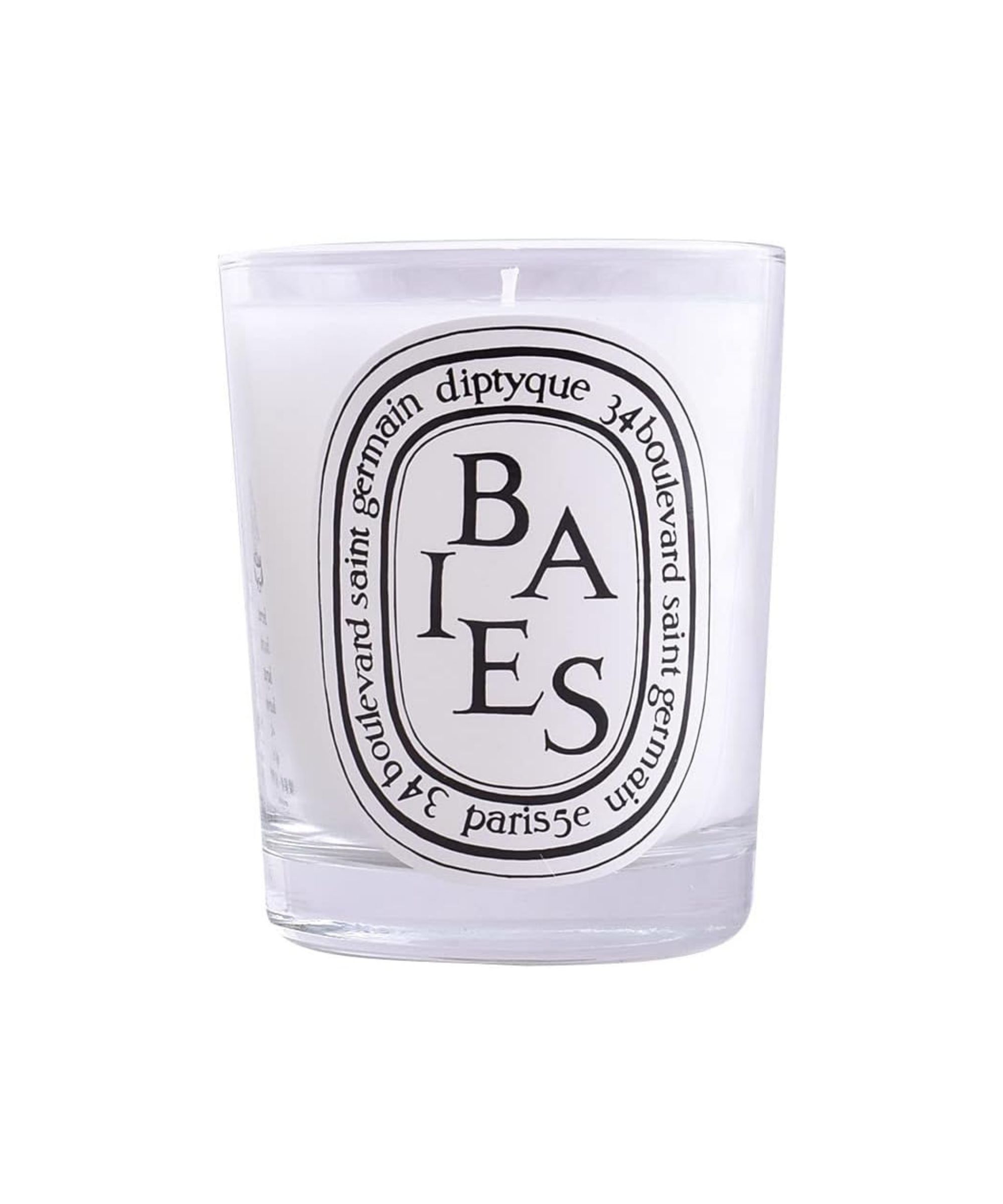 A white Diptique candle