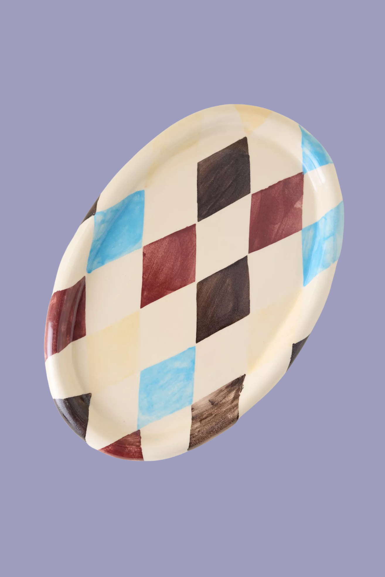 A cream harlequin serving platter