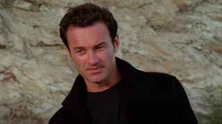 Cole Turner (Julian McMahon) speaks on Charmed