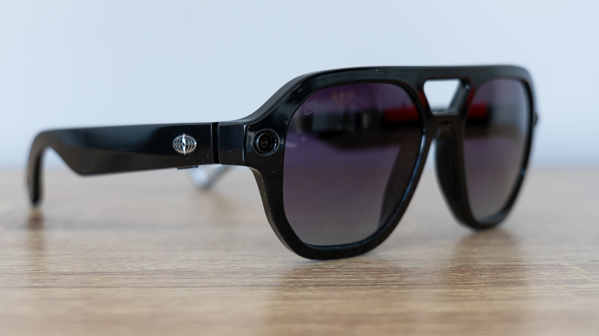 L'Atitude 52&amp;deg;N Smart Glasses review images, in case, on a sideboard and worn outside