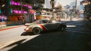 Full path tracing of a car driving through the streets of a City in Cyberpunk 2077.