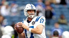 Quarterback Philip Rivers, 44, warms up during his comeback game with the Indianapolis Colts.