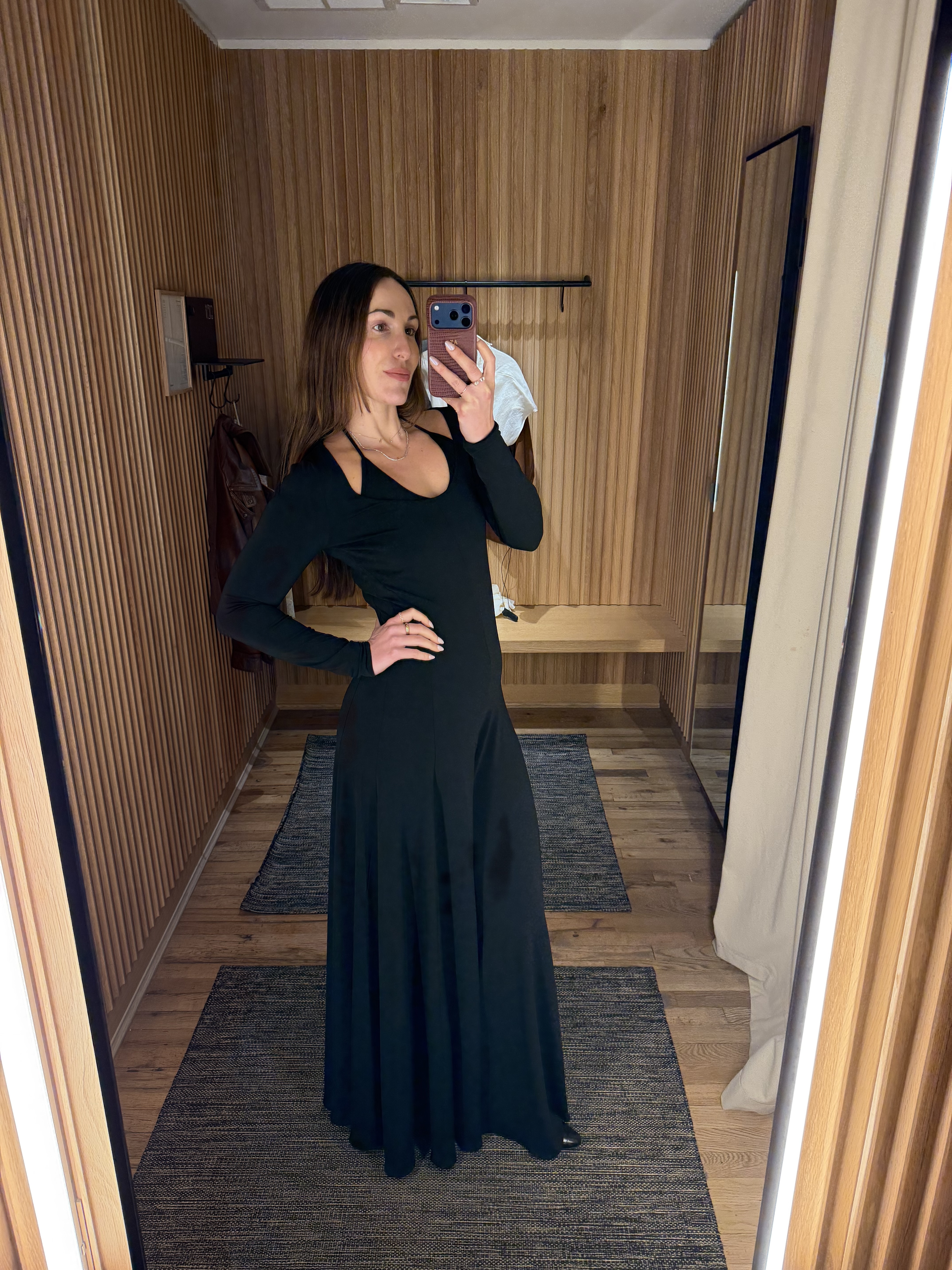 senior fashion editor Anna LaPlaca wearing Mango Selection pieces inside a store dressing room