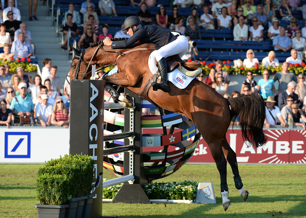 Joe Clee and Utamaro D'Ecaussines on the third day of the European Championships 2015. Picture by Peter Nixon
