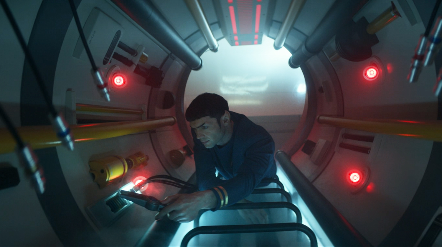 Spock, while working in a Jeffries Tube, gets to converse with Engineer Scott from the USS Farragut