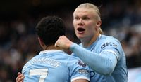 Erling Haaland celebrates with Egyptian striker Omar Marmoush after scoring Manchester City's second goal during the Premier League match against Brentford