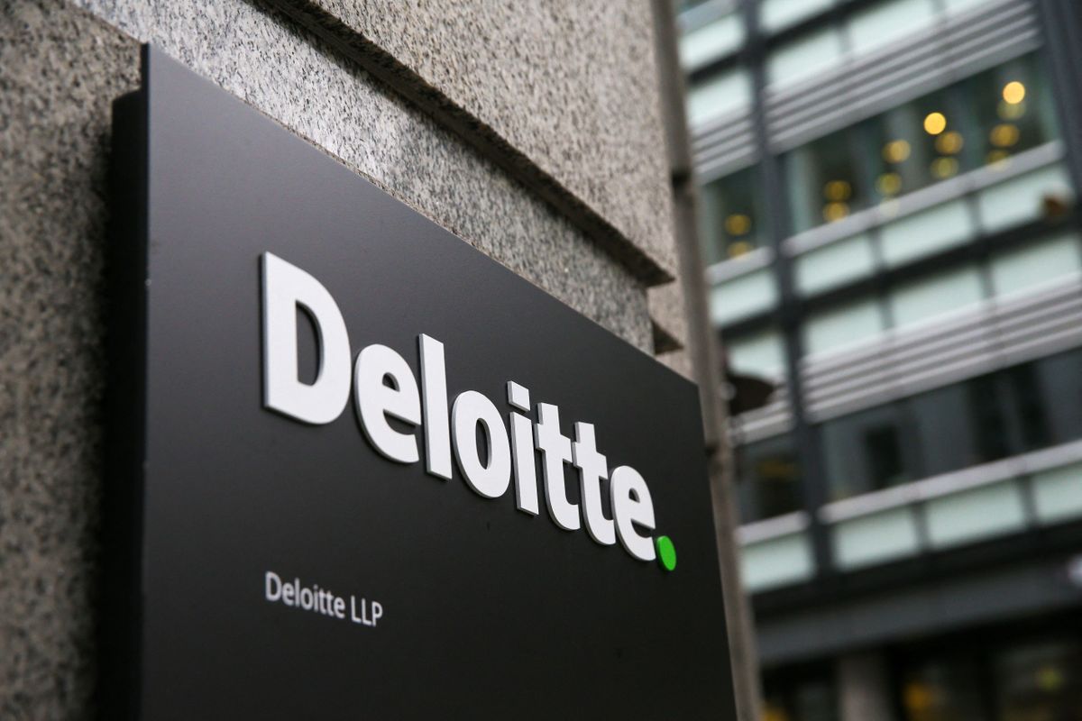 Deloitte logo pictured on a sign outside the company&#039;s offices in London