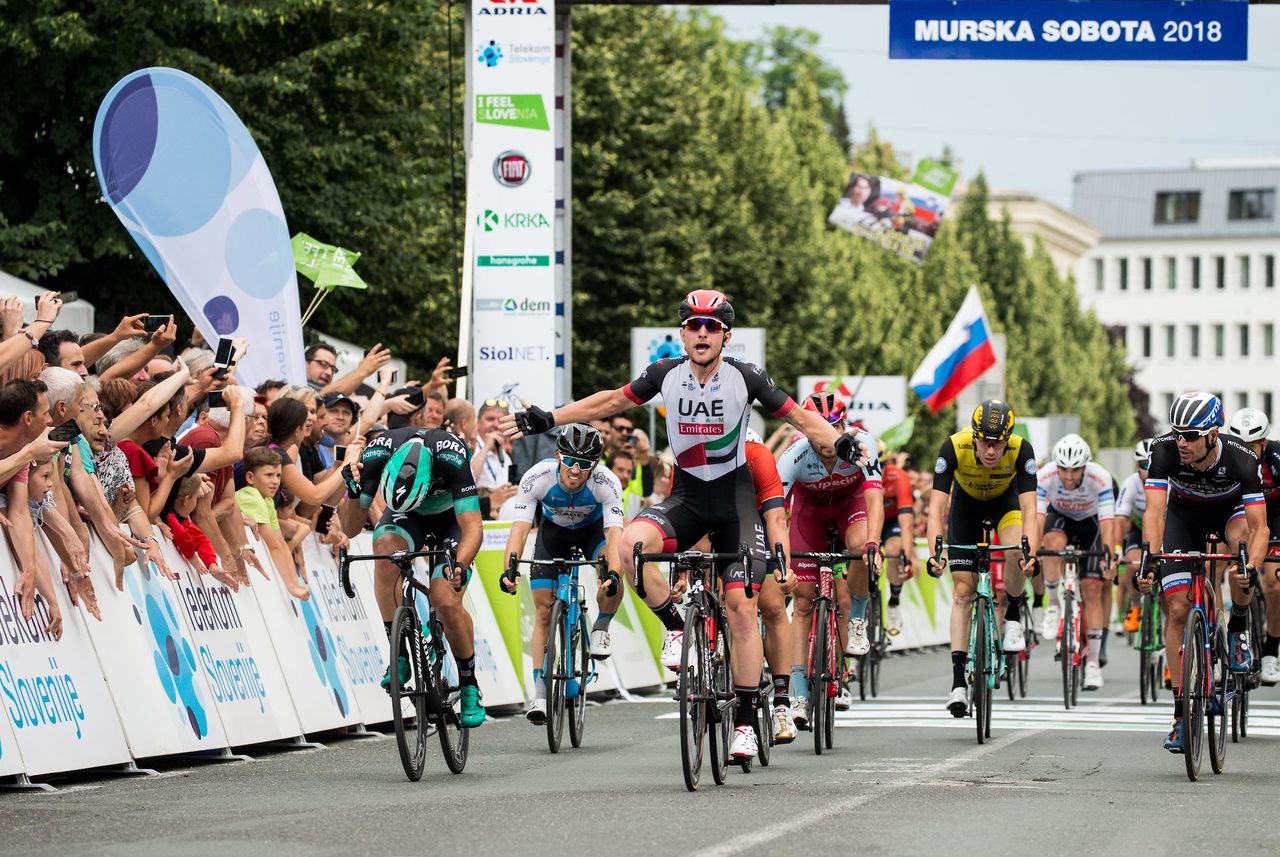 Simone Consonni (UAE Team Emirates) wins the opening stage