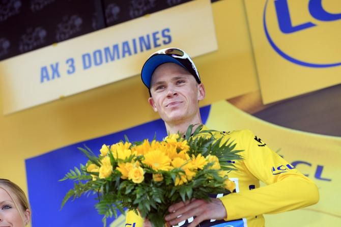 Chris Froome (Sky) resplendent in yellow