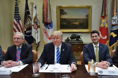 Sen. Mitch McConnell, President Donald Trump, and Rep. Paul Ryan.