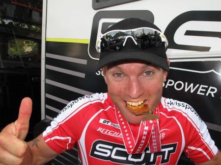 Florian Vogel shows off his medal.