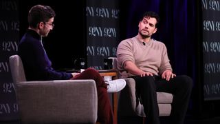 Henry Cavill sitting opposite Josh Horowitz on October 26, 2022.