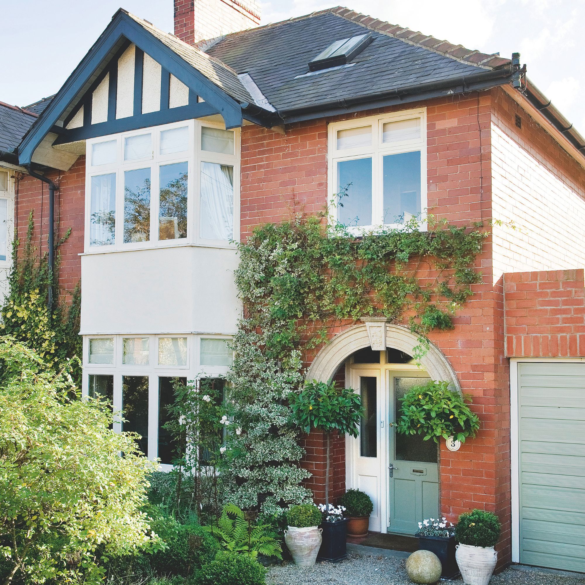 Exterior of house with a side garage, showing the dead space above that could be extended into