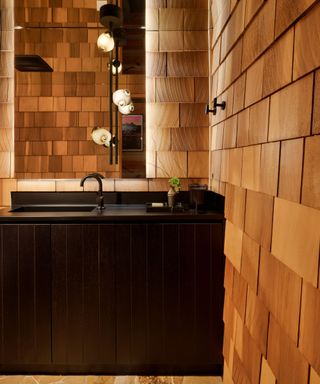 Bathroom with vertical light fixture