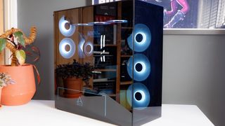 Arctic's Xtender PC case on a white desk with various parts being installed to build a functional gaming PC.