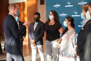 Prince William, Duke of Cambridge speaks with David Auerbach from Sanergy, Olugbenga Olubanjo from Reeddi, Dr Mariana Mayer Pinto from Living Seawalls, Eshrat Waris from SOLshare, Gator Halpern from Coral Vita and Sam Teicher from Coral Vita during The Earthshot Prize Innovation Showcase