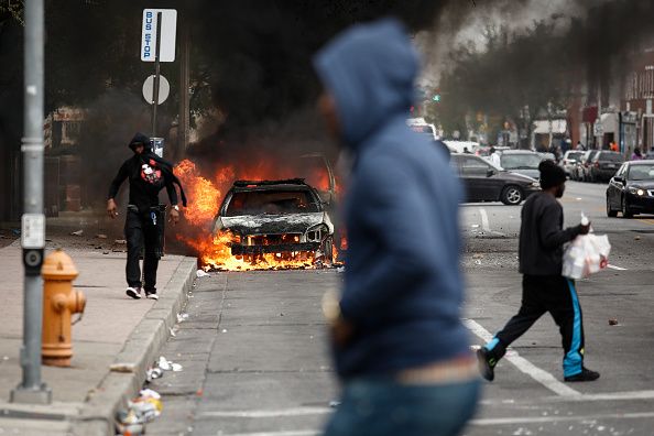 A car on fire in Baltimore.