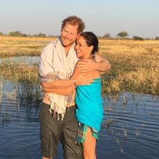 Meghan Markle and Prince Harry pose in a previously unseen 2016 snap of them on vacation together