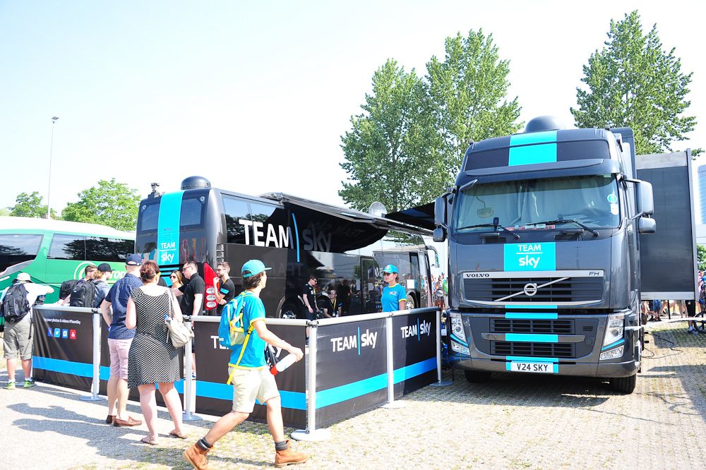 The Team Sky entourage readies for the stage.