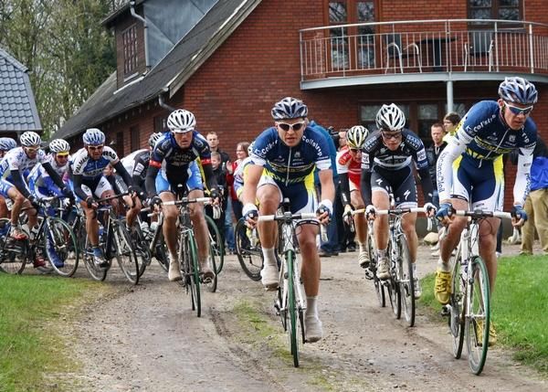 The Peleton lead by Vacansoleil on the 8th Gravel road
