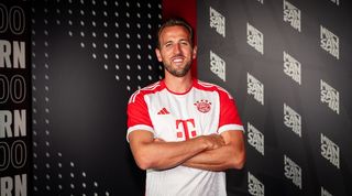 Harry Kane poses in a Bayern Munich shirt after agreeing a tranfer from Tottenham to the German champions in August 2023.