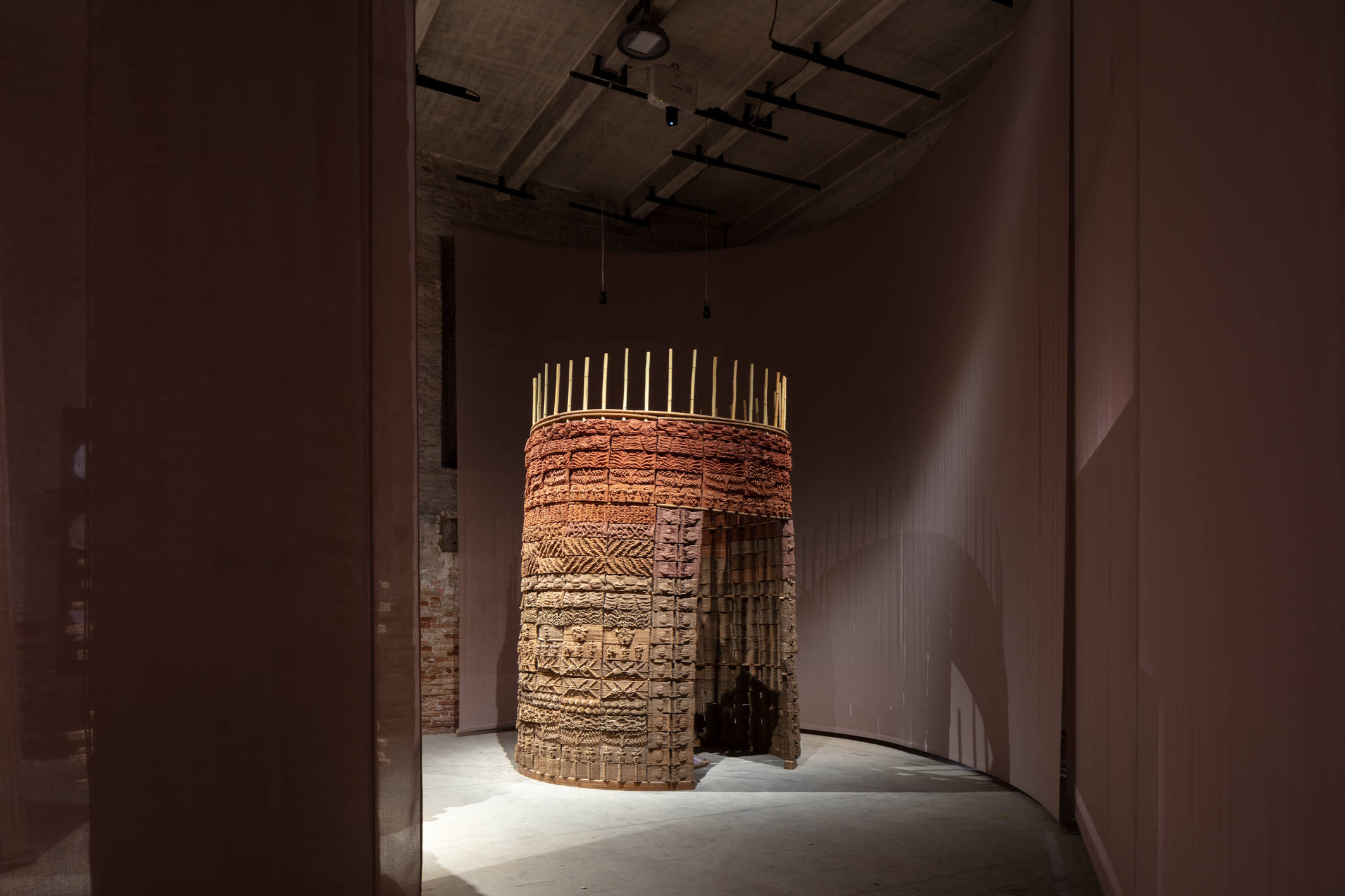 installation views within the arsenale rooms of Intelligens, the main show at venice architecture biennale 2025