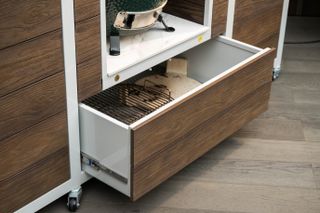 A deep drawer system in an outdoor kitchen