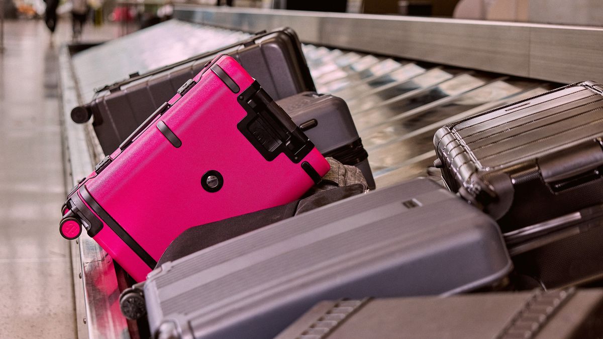T-Mobile rolled out a hot magenta smart suitcase, and I want it