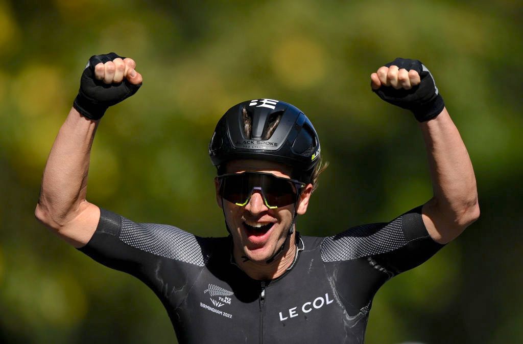 WARWICK, ENGLAND - AUGUST 07: Aaron Gate of Team New Zealand celebrates winning Gold as they cross the finish line duing the Men's Road Race on day ten of the Birmingham 2022 Commonwealth Games at on August 07, 2022 on the Warwick, England. (Photo by Justin Setterfield/Getty Images)