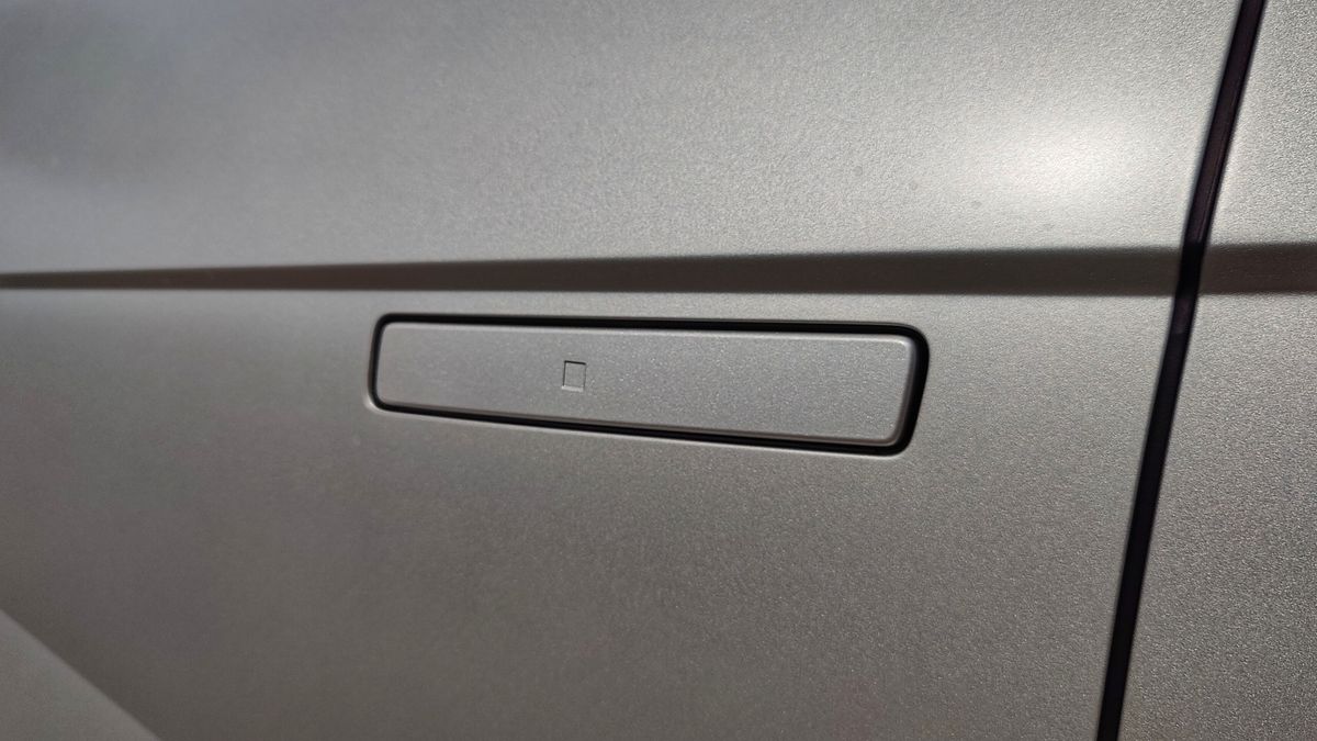 Close-up of door handle sitting flush to bodywork