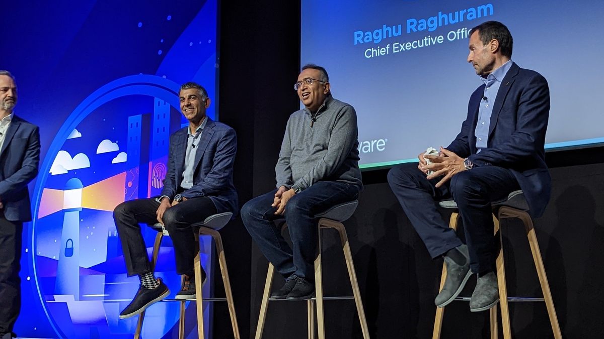 A photo of VMware exec Raghu Ranghuram, Sumit Dhawan and Luigi Freguia at a panel