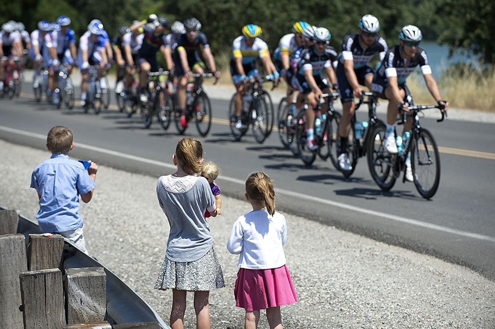 Young fans on the side of the road at the Tour of California opener