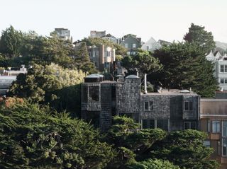 George Homsey's Sea Ranch Home in wood and natural forms that feel organic among trees