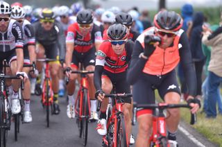 Richie Porte is surrounded by his BMC teammates